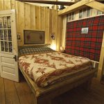 Sarnia Ranch Bedroom in loft of Old Log Barn at Historic Reesor Ranch.