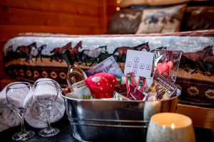 Romance Package in Cowboy's Cabin includes gift basket plus a bottle of Cypress Hills Wine and breakfast