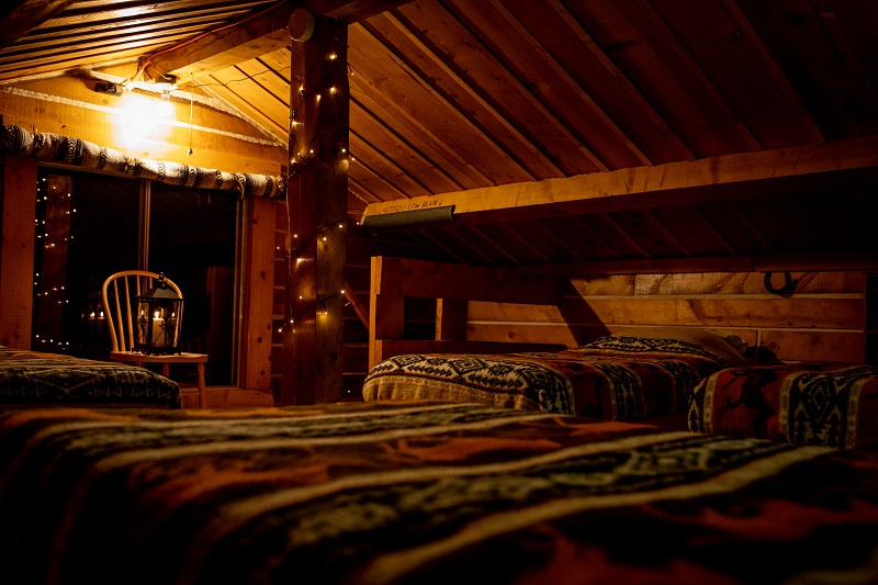 Remind you of GoldiLocks and the Three Bears? Snuggle into four comfy Log Cabin loft beds.